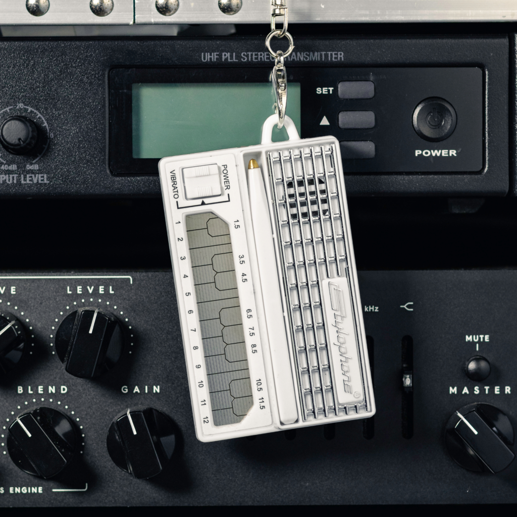 White stylophone mini on radio